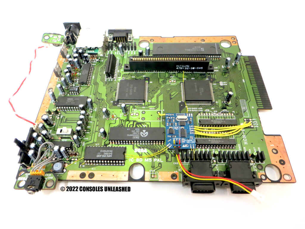 Full top side PCB showing Sega Mega Drive switchless region & IGR & DFO mod kit installed.