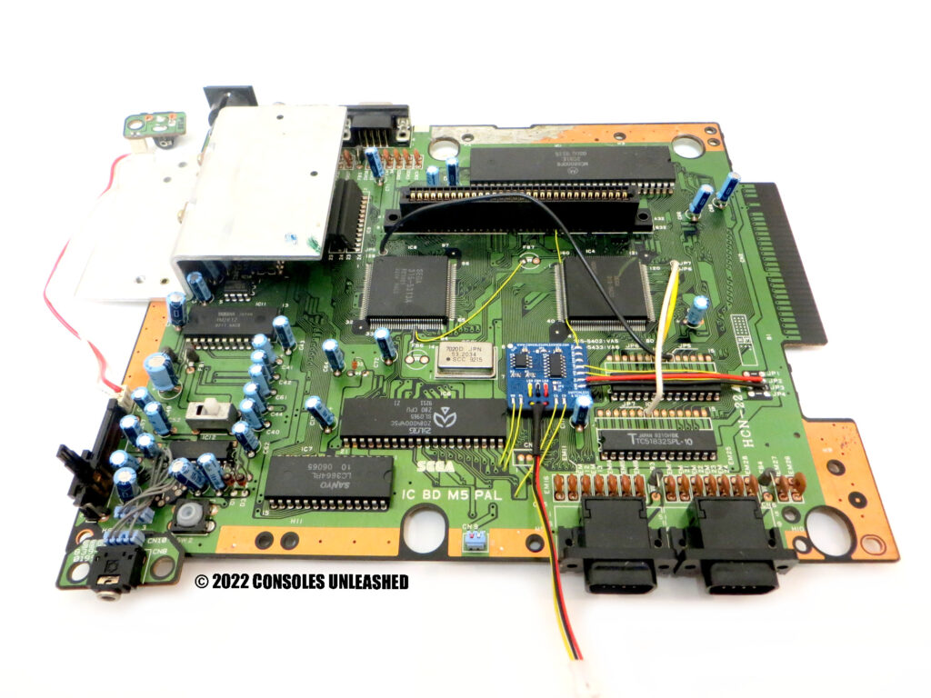 Full top side PCB showing Sega Mega Drive switchless region & IGR mod kit installed.