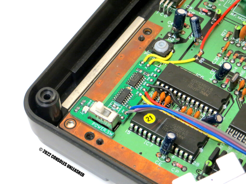 Master System 2 switchless region mod installed showing FM Sound Module connections.