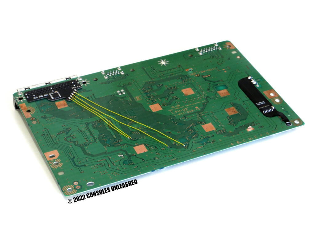 Full bottom side of Sony PlayStation 750X PCB showing X-Reset 750X & SIO-XS mod kits installed.