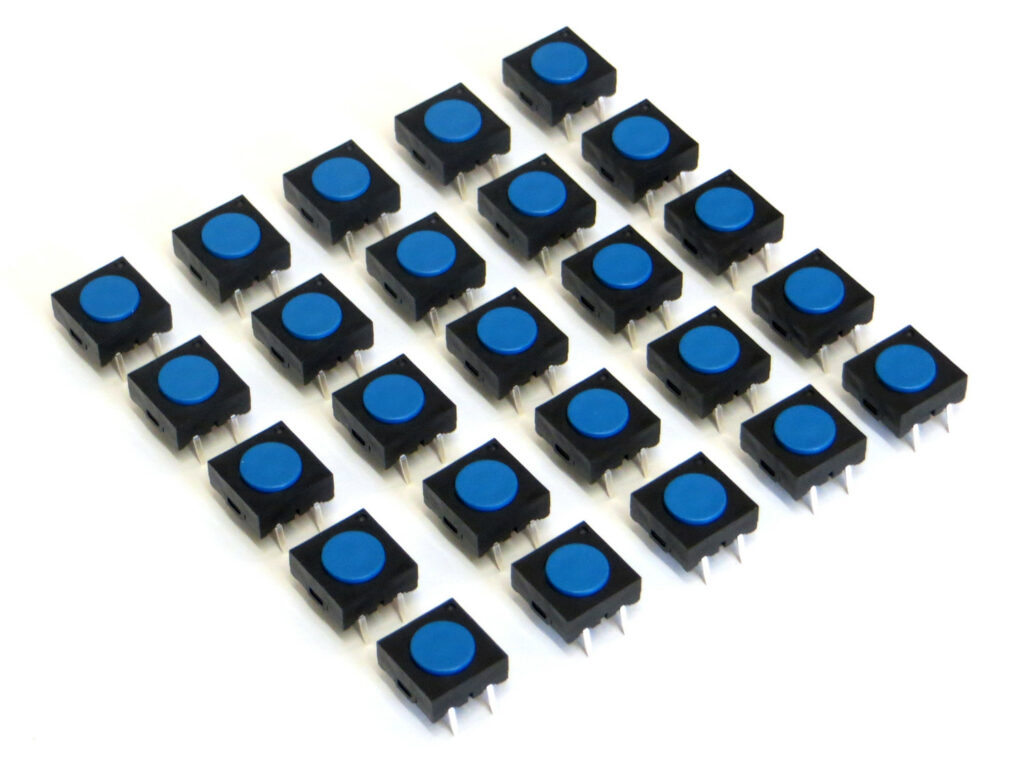 Blue replacement SEGA switches displayed in a grid on a white background.